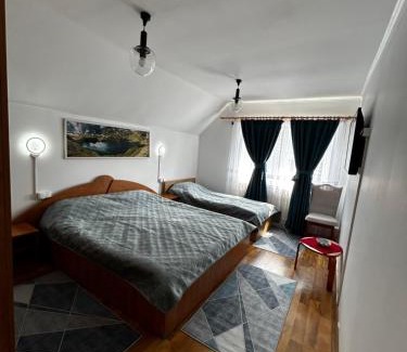 Porumbacu de Sus Maison | Casa cu brazi