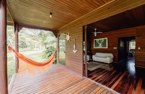 Pantano do Sul Maison | Casa de Praia em Frente ao Rio na Armação
