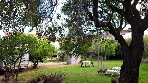 Carbonia Appartement | Casa del Sole - Trilocale con giardino