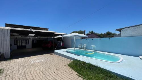 Mariana Maison | Casa Familiar com 2 Quartos