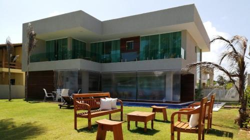 Parafuso Maison | Casa Frente Mar 5 Suítes Guarajuba em Condomínio