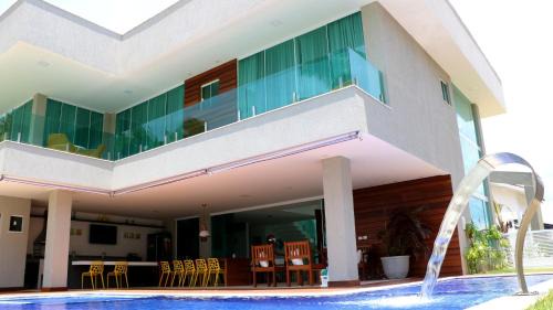 Parafuso Maison | Casa Frente Mar 5 Suítes Guarajuba em Condomínio