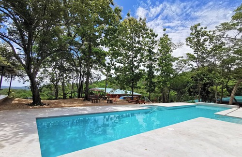Rio Seco Maison | Casa Illimani pool side gorgeous mountain ocean views from hilltop