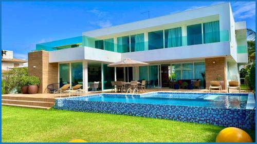 Parafuso Maison | Casa Paraíso 6 Suítes Pé na Areia em Guarajuba