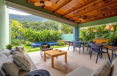 Guaeca Maison | Casa Patropi na Praia de Guaecá - condomínio fechado, piscina aquecida e internet 500mb