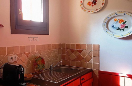 Loiri Porto San Paolo Maison | Casa Perella E: A graceful cottage surrounded by the greenery, with Free WI-FI.