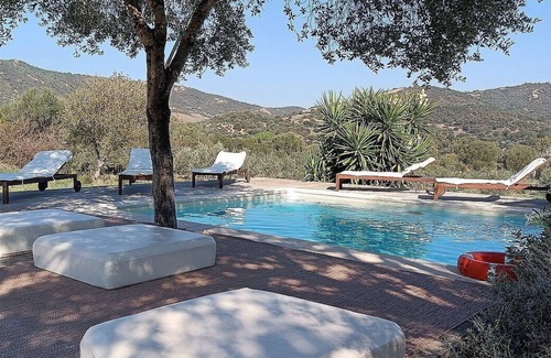 Loiri Porto San Paolo Maison | Casa Perella E: A graceful cottage surrounded by the greenery, with Free WI-FI.