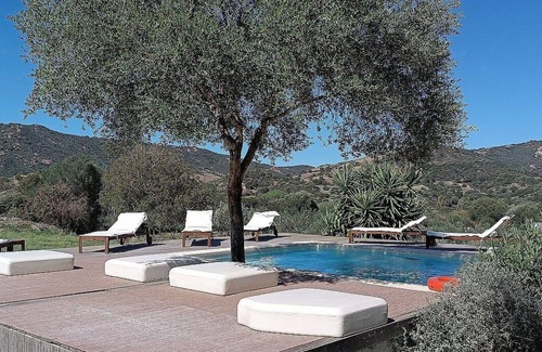 Loiri Porto San Paolo Maison | Casa Perella E: A graceful cottage surrounded by the greenery, with Free WI-FI.