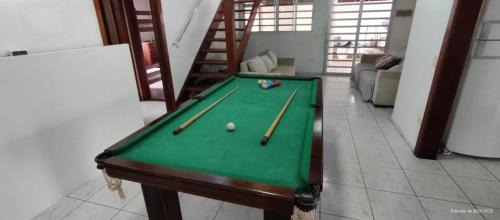 Jardim Neptunia Maison | Casa piscina pé na areia Bertioga