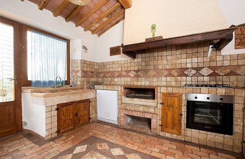 Castiglione d'Orcia Maison | Casa Salvia E: Un appartement dans le style caractéristique de la campagne toscane.