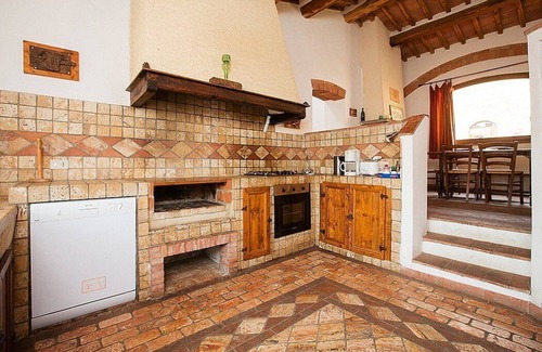 Castiglione d'Orcia Maison | Casa Salvia E: Un appartement dans le style caractéristique de la campagne toscane.