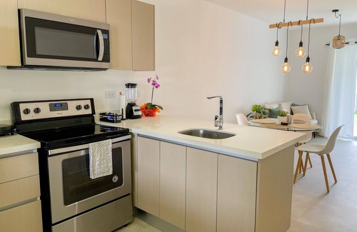San Joaquin de Flores Copropriété | Casa Serena: Cozy 2BR Home with A/C & Fast Wi-Fi