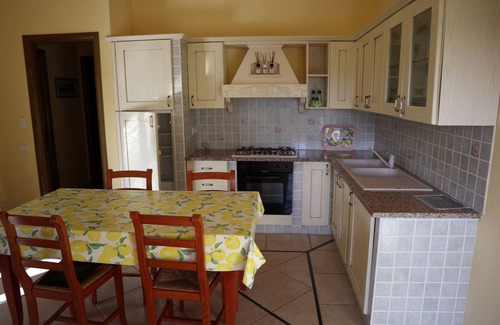 Porto Pino Maison | Casa Vacanze a Pochi Passi Dalla Bellissima Spiaggia di Portopino