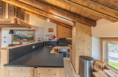 Cortina d'Ampezzo Appartement | Casa Verocip, a panoramic attic with a view of the Dolomites