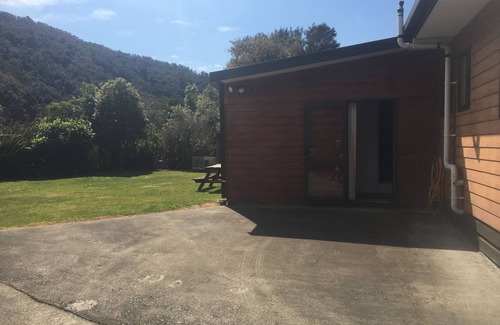 Okiwi Bay Maison | Catseye Cottage - Pêche fantastique dans ce merveilleux endroit.