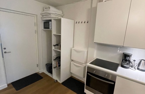 Midtbyen Appartement | Small Central Apartment with Balcony and Shared Panorama Rooftop