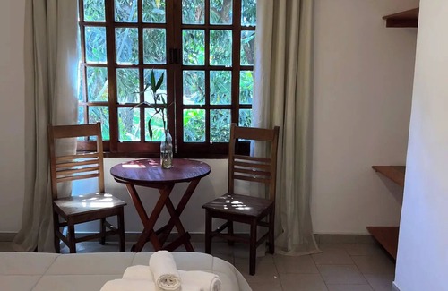 Puerto Iguazu Appartement | Central Cozy apartment in charming Puerto Iguazú with WiFi, AC-1C