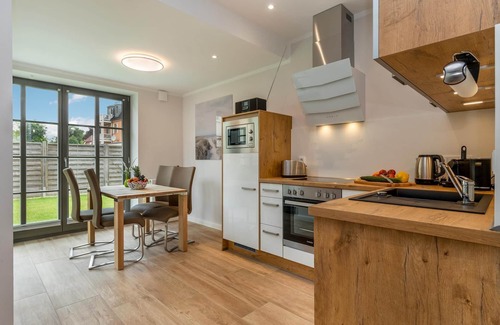 Zingst Appartement | Central newly built vacation apartment with gas fireplace near the beach for 4 pers.