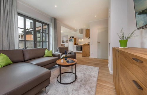 Zingst Appartement | Central newly built vacation apartment with gas fireplace near the beach for 4 pers.