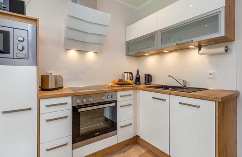Zingst Appartement | Central newly built vacation apartment with gas fireplace near the beach for 4 pers.