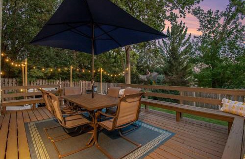 West Omaha Maison | Central Family Oasis with Hot Tub & Fenced Yard
