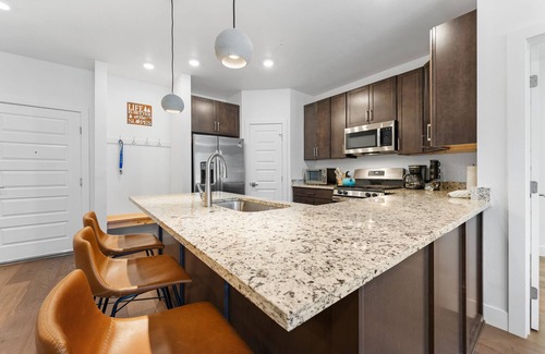 Lakeside Village Copropriété | Central Location with Scenic Mountain Vista Views from the Private Balcony!