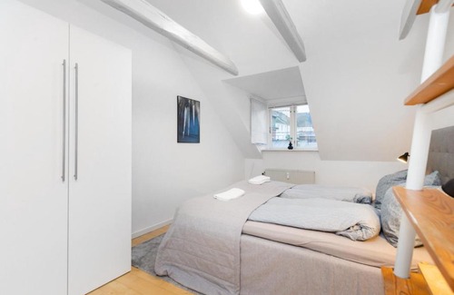 Midtbyen Appartement | Centralt Byliv - 2 Soveværelser med plads til 6