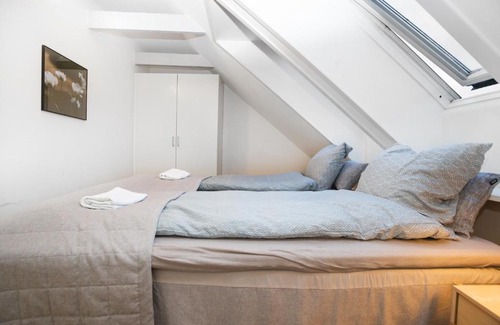 Midtbyen Appartement | Centralt Byliv - 2 Soveværelser med plads til 6