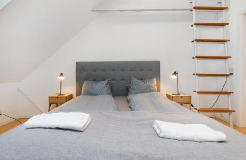 Midtbyen Appartement | Centralt Byliv - 2 Soveværelser med plads til 6