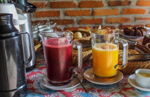 Praia Grande Maison | Chalé Suiço com Hidromassagem e café da Manhã