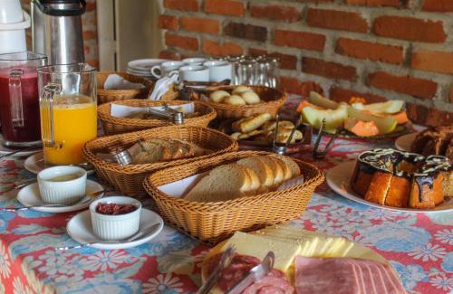Praia Grande Maison | Chalé Suiço com Hidromassagem e café da Manhã