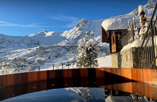 Le Grand-Bornand Chalet De Ski | Chalet Argali - séjour exclusif skis aux pieds pour 14 - OVO Network