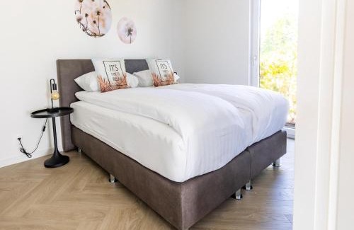 Municipality of Veldhoven Chalet De Ski | Chalet by Pond in Holiday Park
