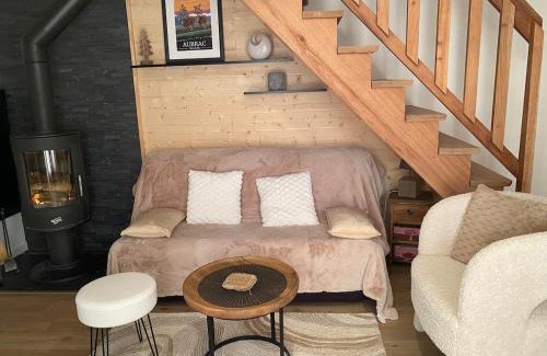 Laguiole Appartement | Chalet chaleureux et fonctionnel