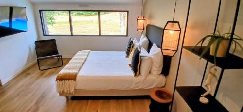 La Menardais Appartement | Chambres d'hôtes 'La Clairière aux Chênes'