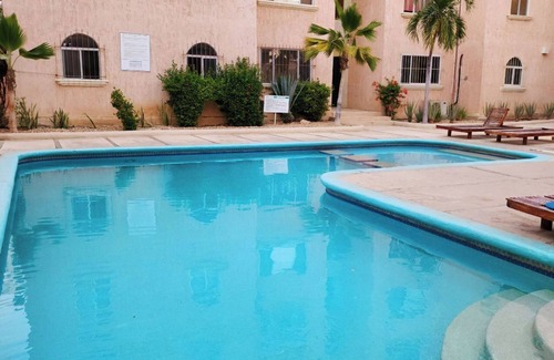 Ampliacion Juarez Copropriété | Charming 1-bedroom Cabo condo, walkable, WiFi, AC, near beaches and nightlife!