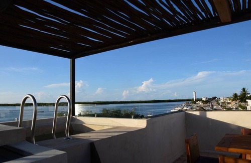 Rio Lagartos Appartement | Charming 1-Bedroom Apartment in Río Lagartos. AC, Rooftop Deck & Private Pier -F