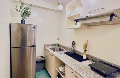 Sasa Copropriété | Charming 2-bedroom condo with WiFi and AC in lovely Davao City