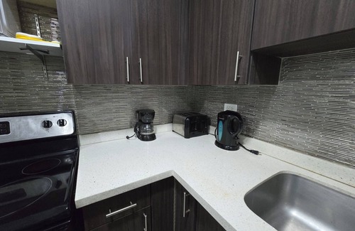 New Kingston Appartement | Charming 2-bedroom Penthouse apartment @The Bromptons New Kingston w/pool & gym