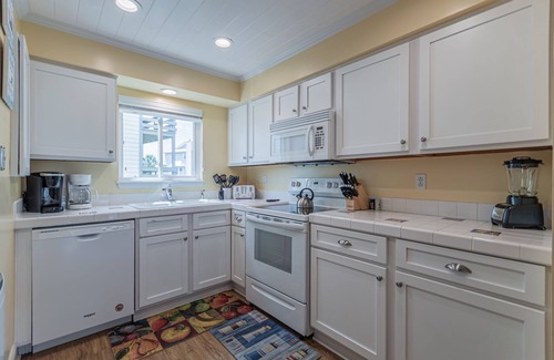 Tybee Island Copropriété | Charming 2-bedroom condo in lovely Tybee Island with Beach Access and Pool