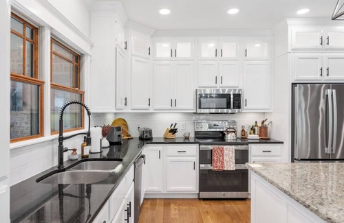 Bethpage Maison | Charming 3 bed, 2.5 bath farmhouse with hot tub, firepit, and seasonal pool!
