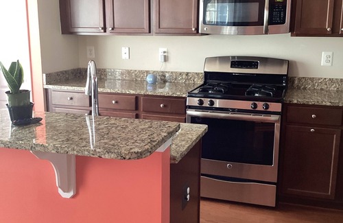 Laurel Maison | Charming 3-bedroom townhome with WiFi, AC, & Community pool in serene Laurel, Md
