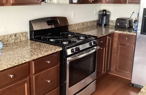 Laurel Maison | Charming 3-bedroom townhome with WiFi, AC, & Community pool in serene Laurel, Md