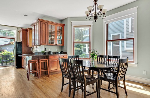 Uptown Maison | "Charming 4BR Home Steps to Lake of the Isles with Fenced Yard & Deck"