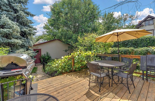 Uptown Maison | "Charming 4BR Home Steps to Lake of the Isles with Fenced Yard & Deck"