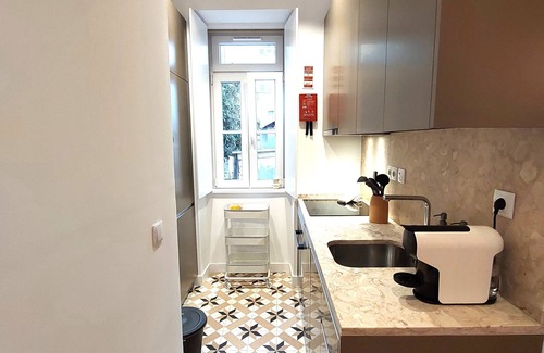 Penha de Franca Copropriété | Charming Apartment in a Private Condominium at Graça