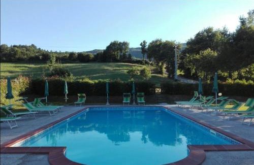 Caprese Michelangelo Appartement | Charming apartment in Caprese Michelangelo, shared pool.