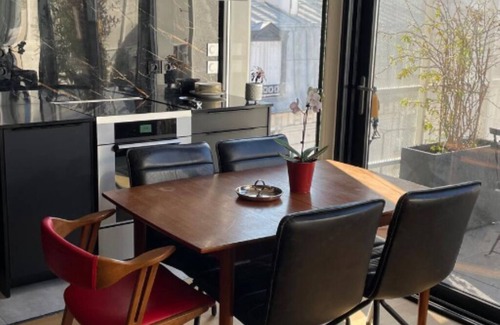 Cœur de Ville Appartement | Charmant appartement avec terrasse ensoleillée à 10 minutes à pied de La Défense