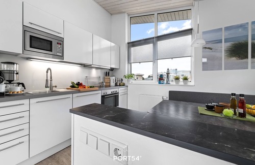 Wendtorfer Strand Maison | Möwe12 - upscale furnishings, best sea view, large balcony. Garden, Whirlpool, Bikeport