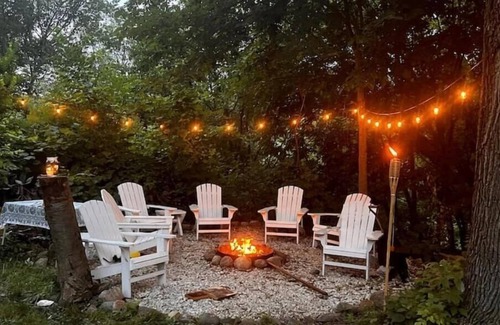 Payne - Phalen Maison | Charming Cottage with Hot Tub, Fire Pit, & Wooded Backyard